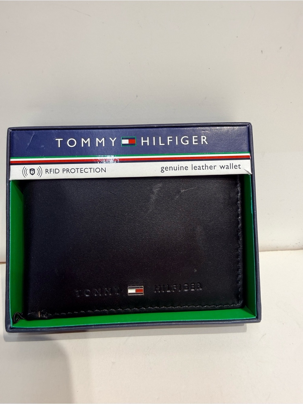 Tommy Hilfiger Black Leather Men's Bi-Fold Wallet with Signature Flag